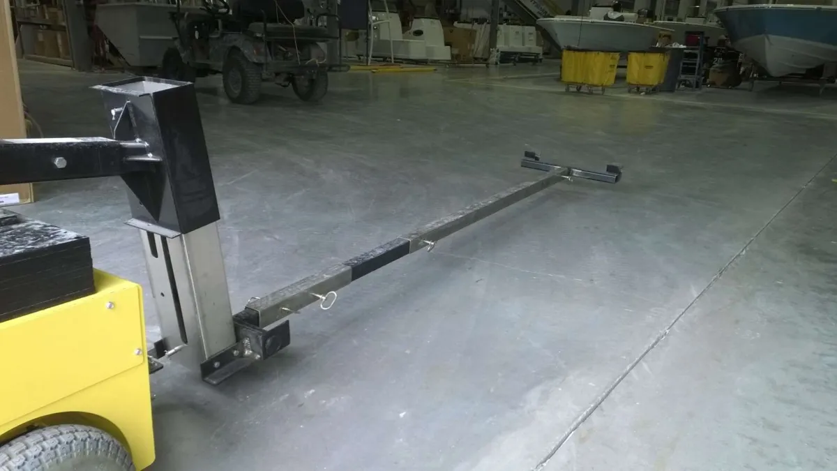 CartCaddy5W electric cart pusher in use
