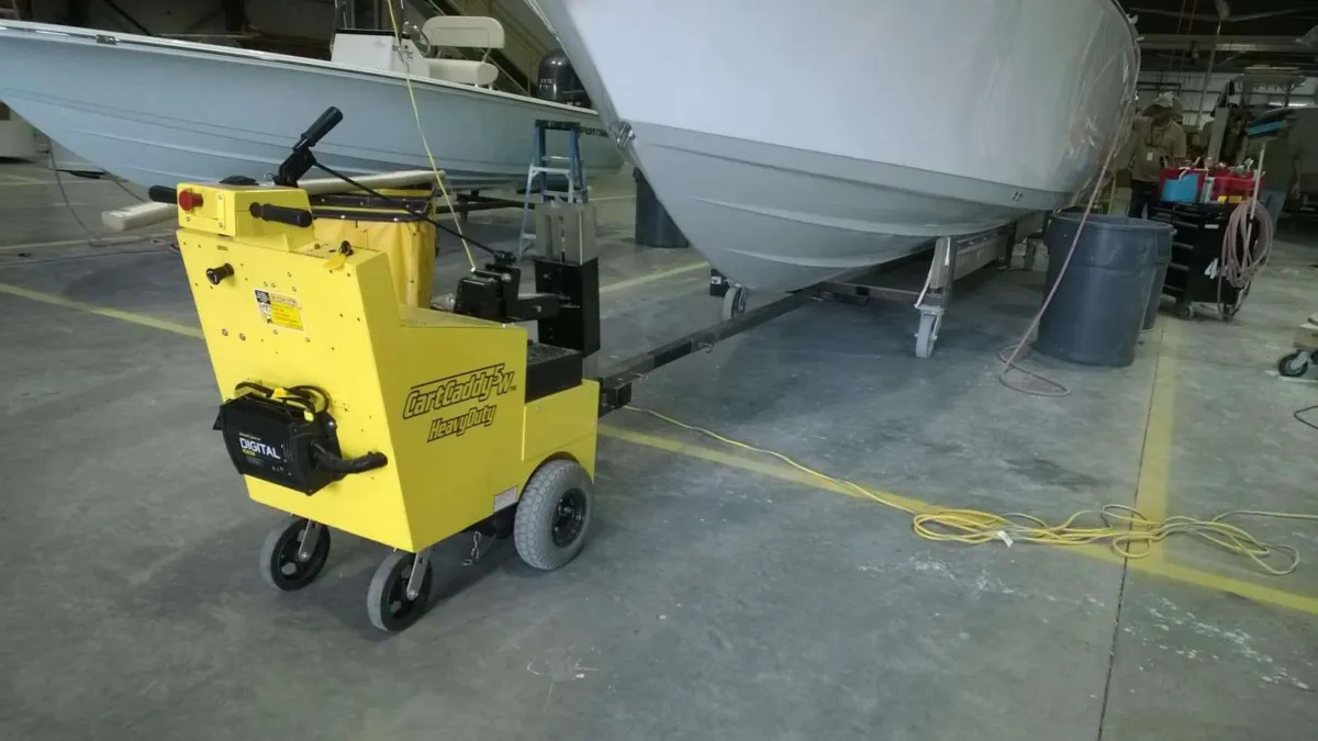 CartCaddy5W electric cart pusher in use